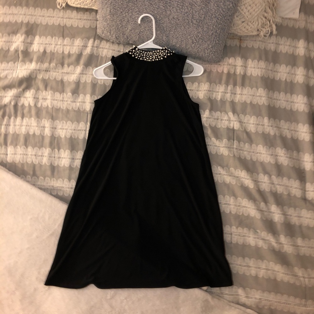 Black knee length dress with pearl detail